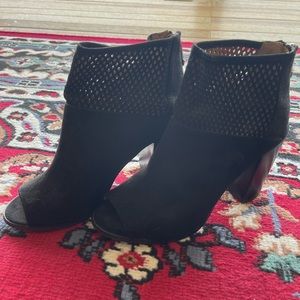Open toe black booties with cut-out detail